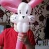 A watermarked balloon modelling rabbit wand