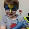 a watermarked face painting wolverine mask and glove
