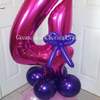 a balloon watermarked no 4 on stand